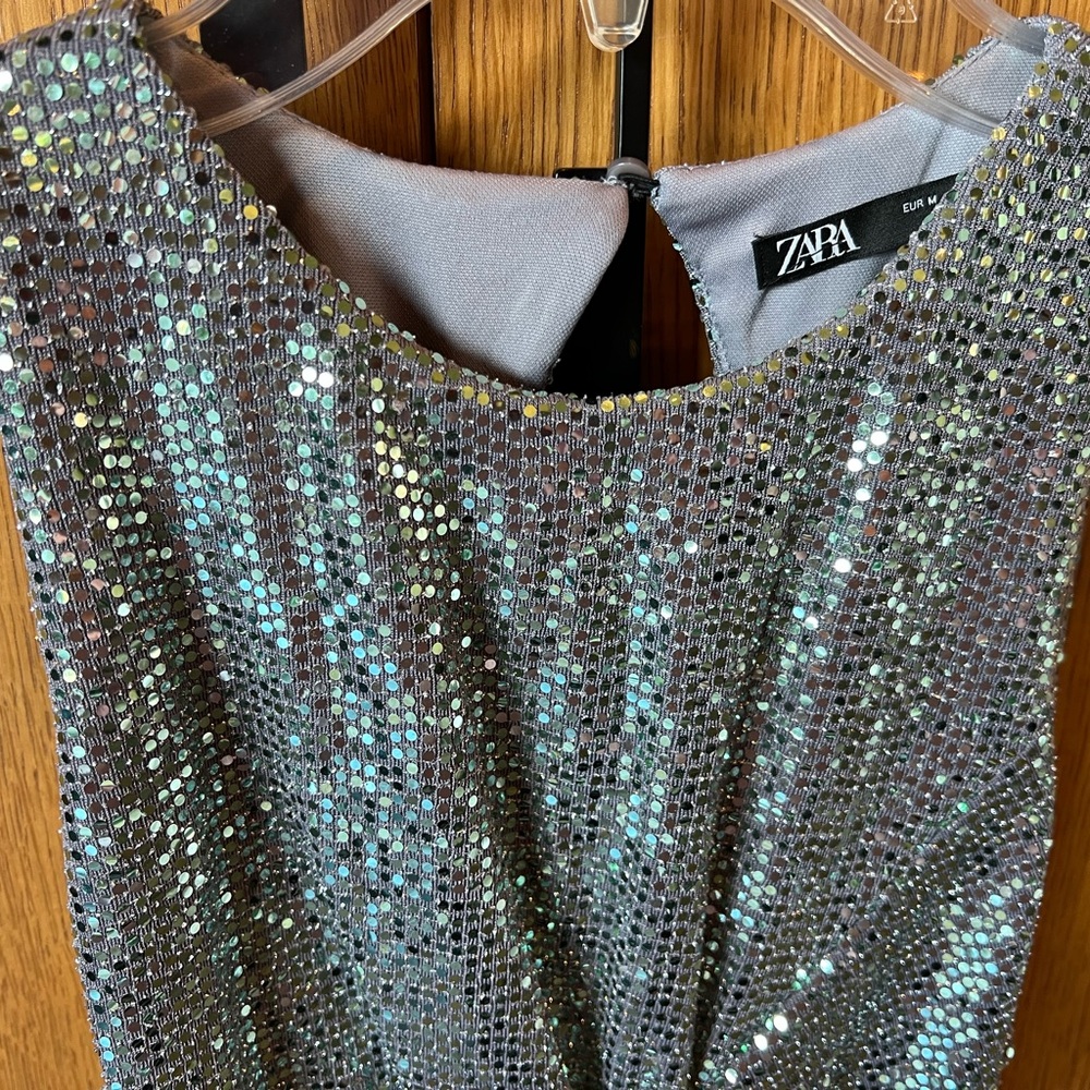 Mint sequins dress by Zara. Formfitting, sleeveless silhouette.